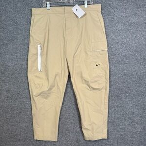 NEW Nike Utility Cargo Pants Mens 38 Beige Khaki Tapered Leg Swoosh Standard Fit